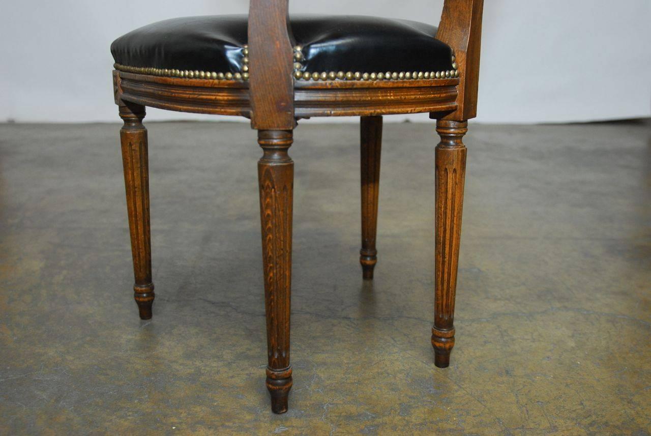 20th Century Set of Four Louis XVI Leather and Cane Dining Chairs