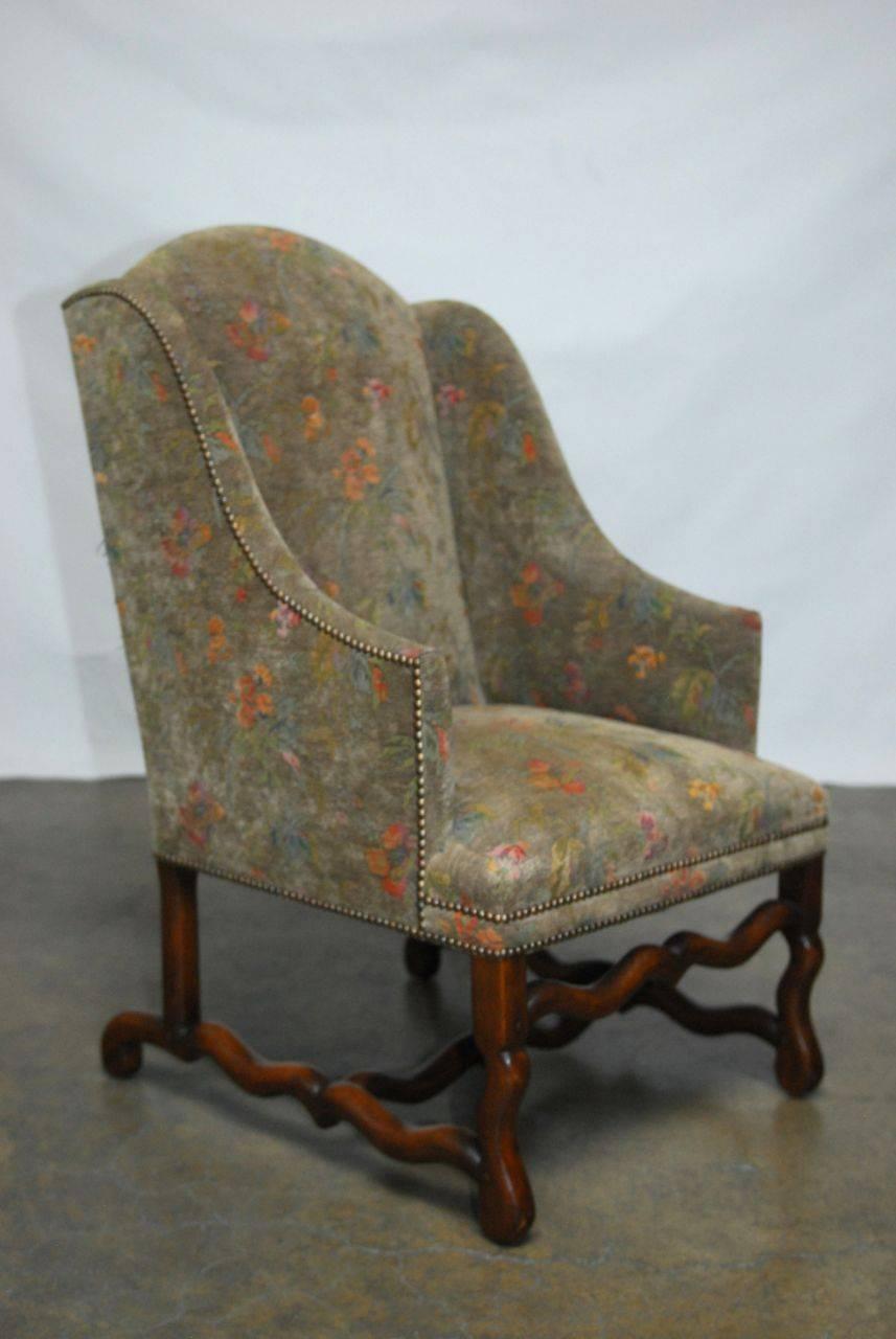 Louis XIII Pair of Walnut Os De Mouton Upholstered Wingback Chairs