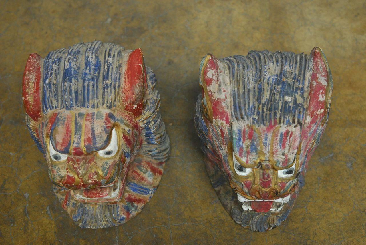 Southeast Asian Pair of Polychrome Foo Lion Roof Ornament Heads