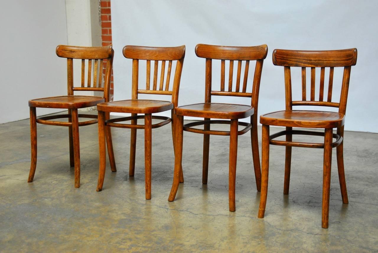 Mid-Century Modern Set of Four Thonet Style Bentwood Bistro Chairs