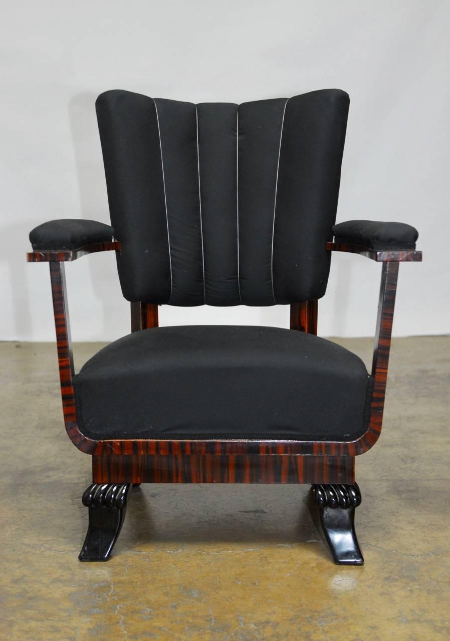 Fantastic pair of French Art Deco period armchairs featuring a unique architectural open design with 