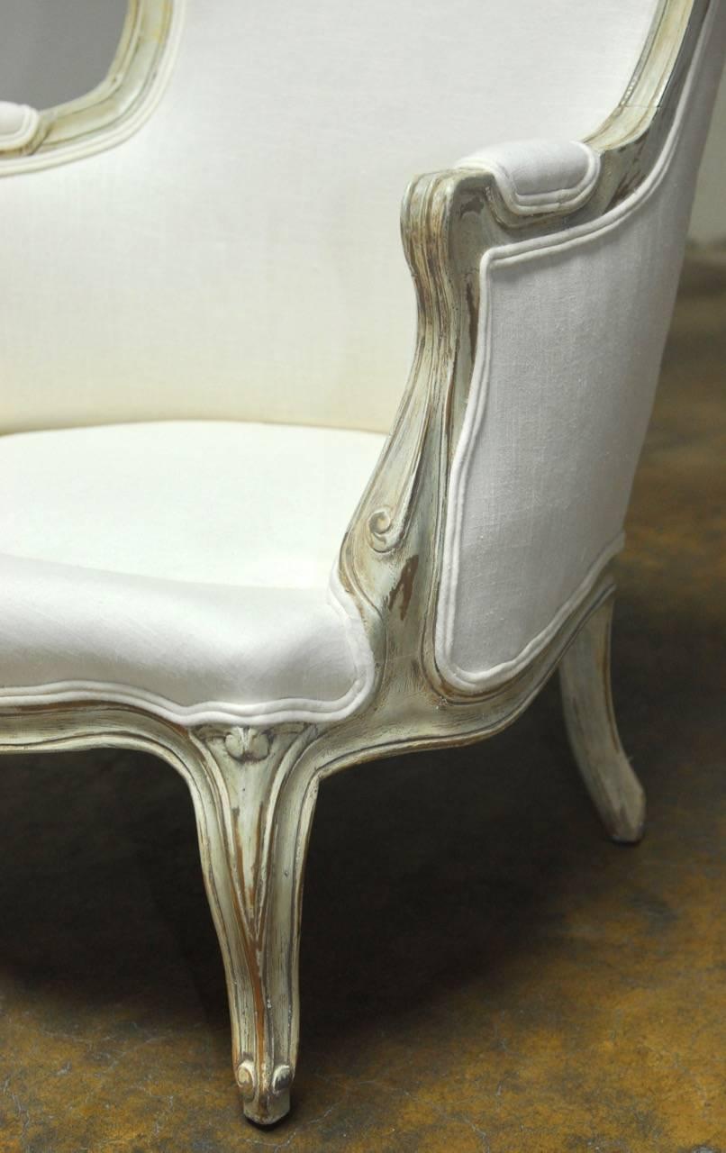 Hand-Carved Louis XV Painted Wing Chair and Ottoman