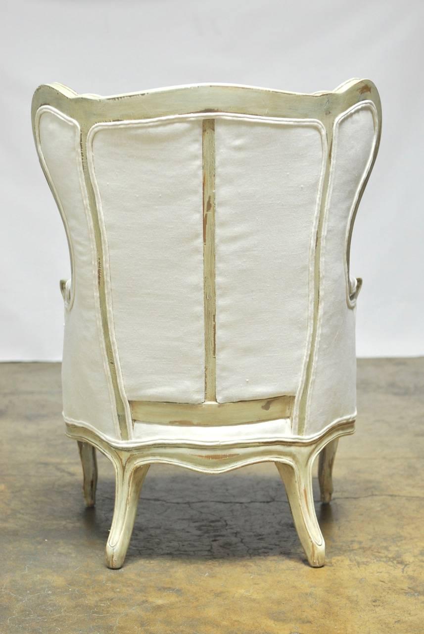 Louis XV Painted Wing Chair and Ottoman 1