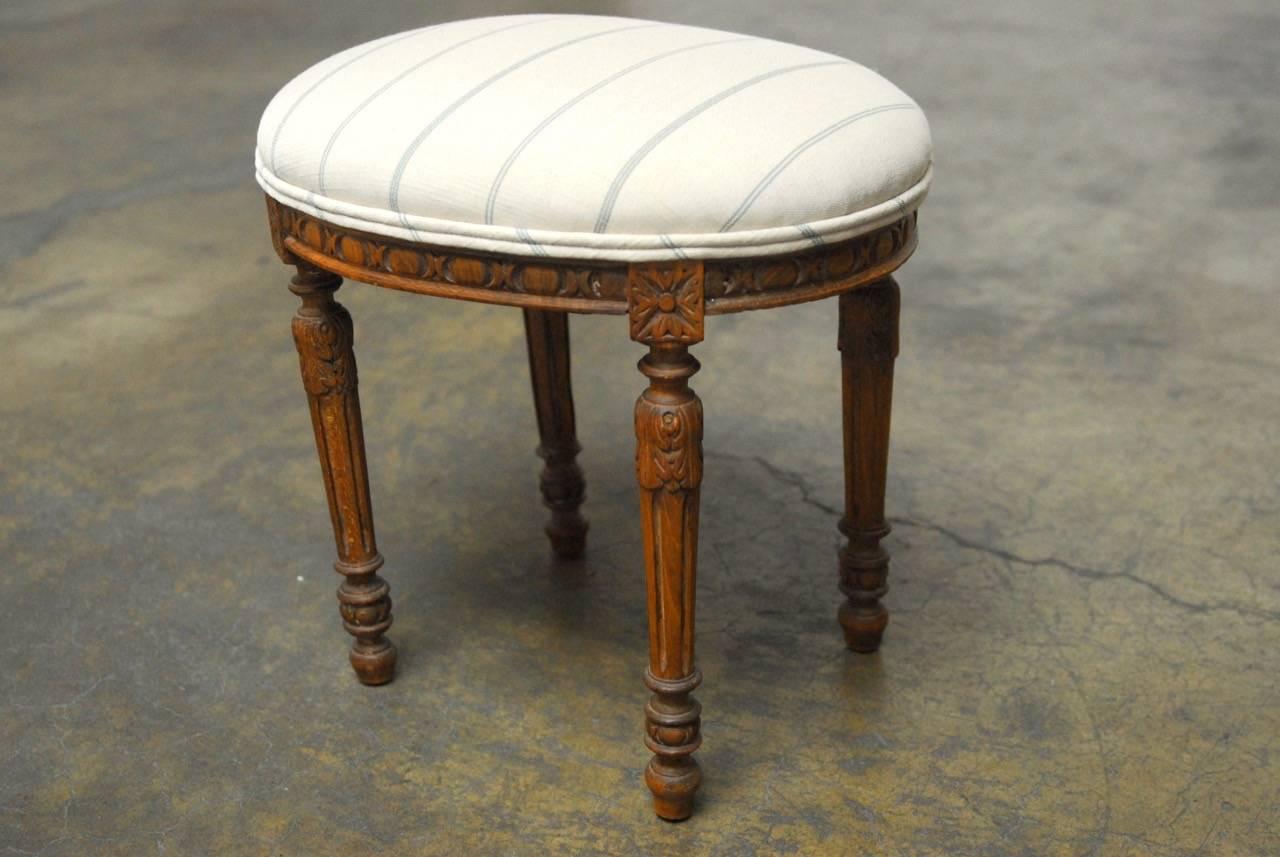 Hand-Carved Louis XVI Oval Footstool with French Linen