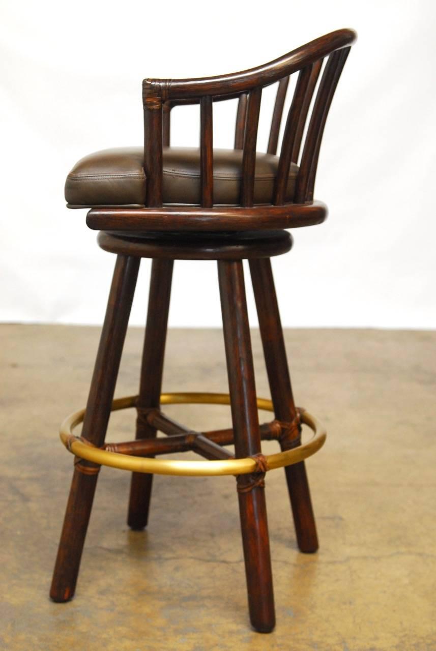 Organic Modern Pair of McGuire Bamboo Rattan and Leather Swivel Barstools