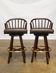 Pair of McGuire Bamboo Rattan and Leather Swivel Barstools