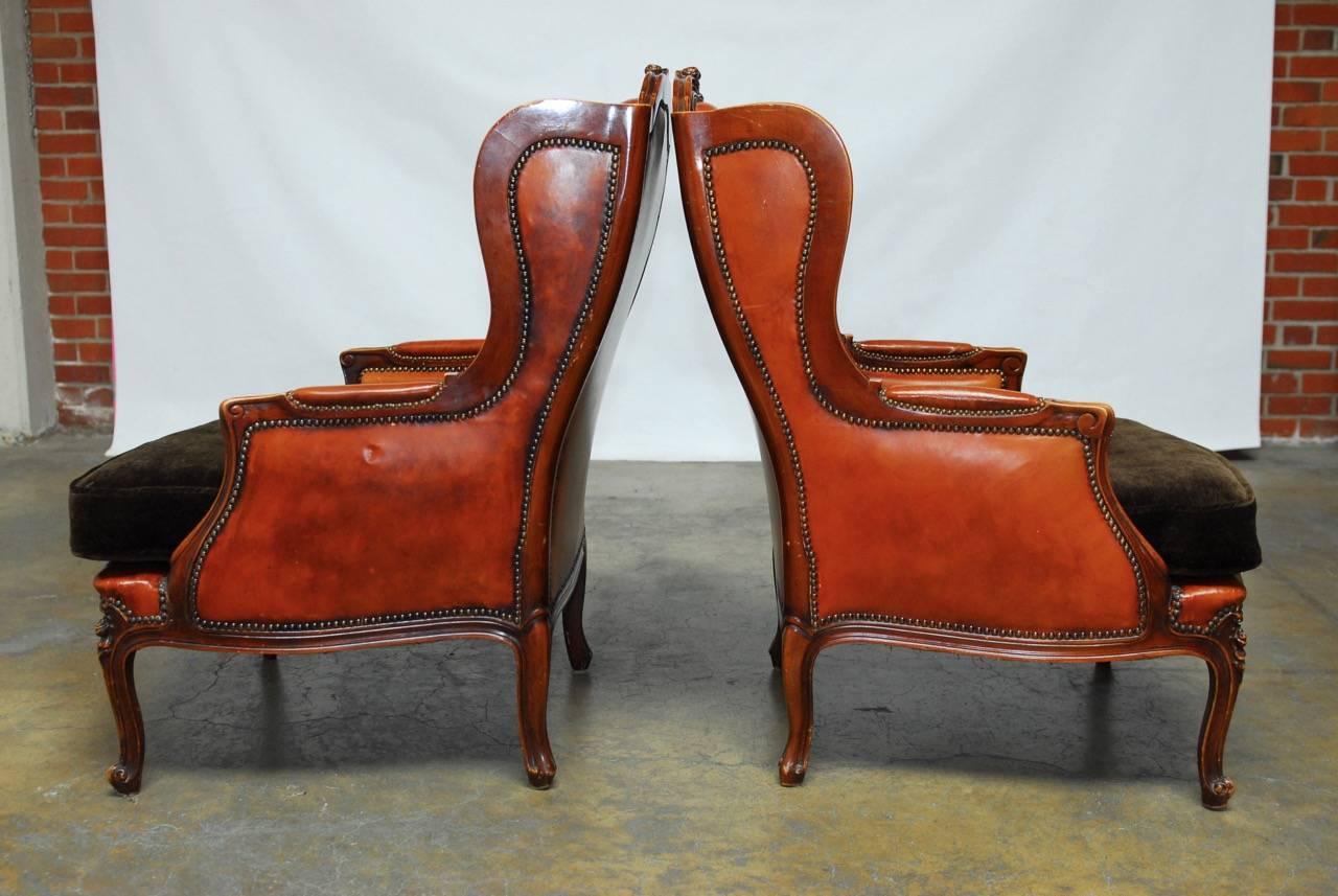 Hand-Carved Pair of Louis XV Tufted Cognac Leather Wingbacks