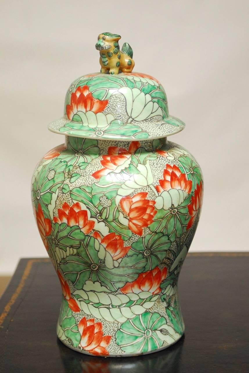 Qing Pair of Lotus Blossom Temple Ginger Jars with Foo Dogs