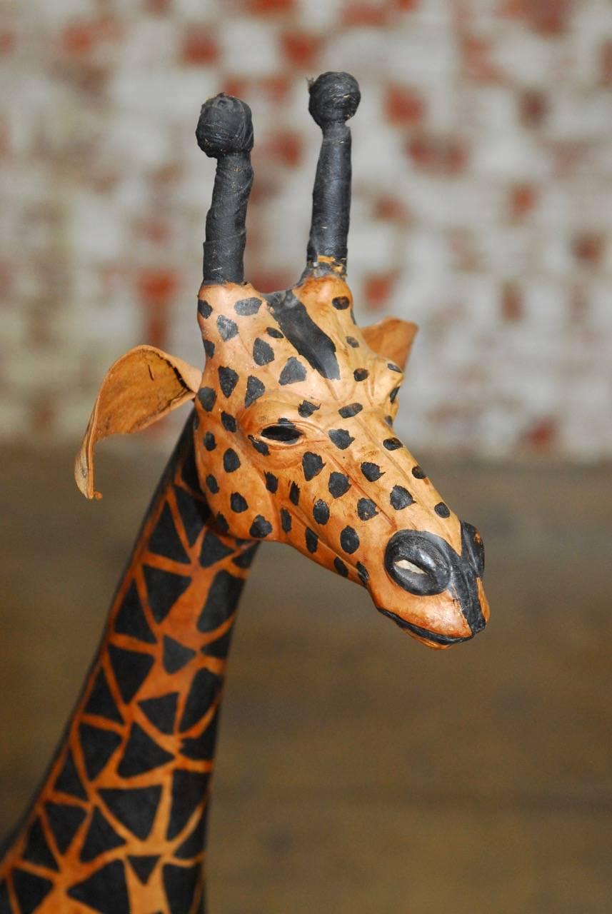 Indian Pair of Painted Leather Giraffe Sculptures