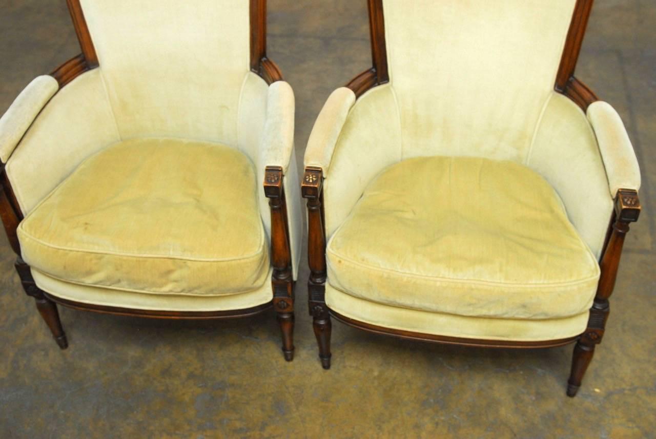 Hand-Carved Pair of Louis XVI Bergeres in the Manner of Jansen