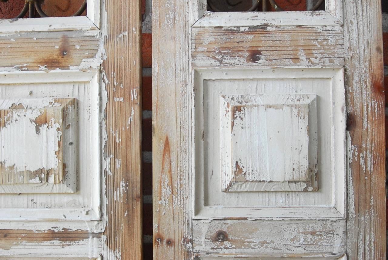 Hand-Crafted Pair of Pine Window Shutters with Scrolled Ironwork