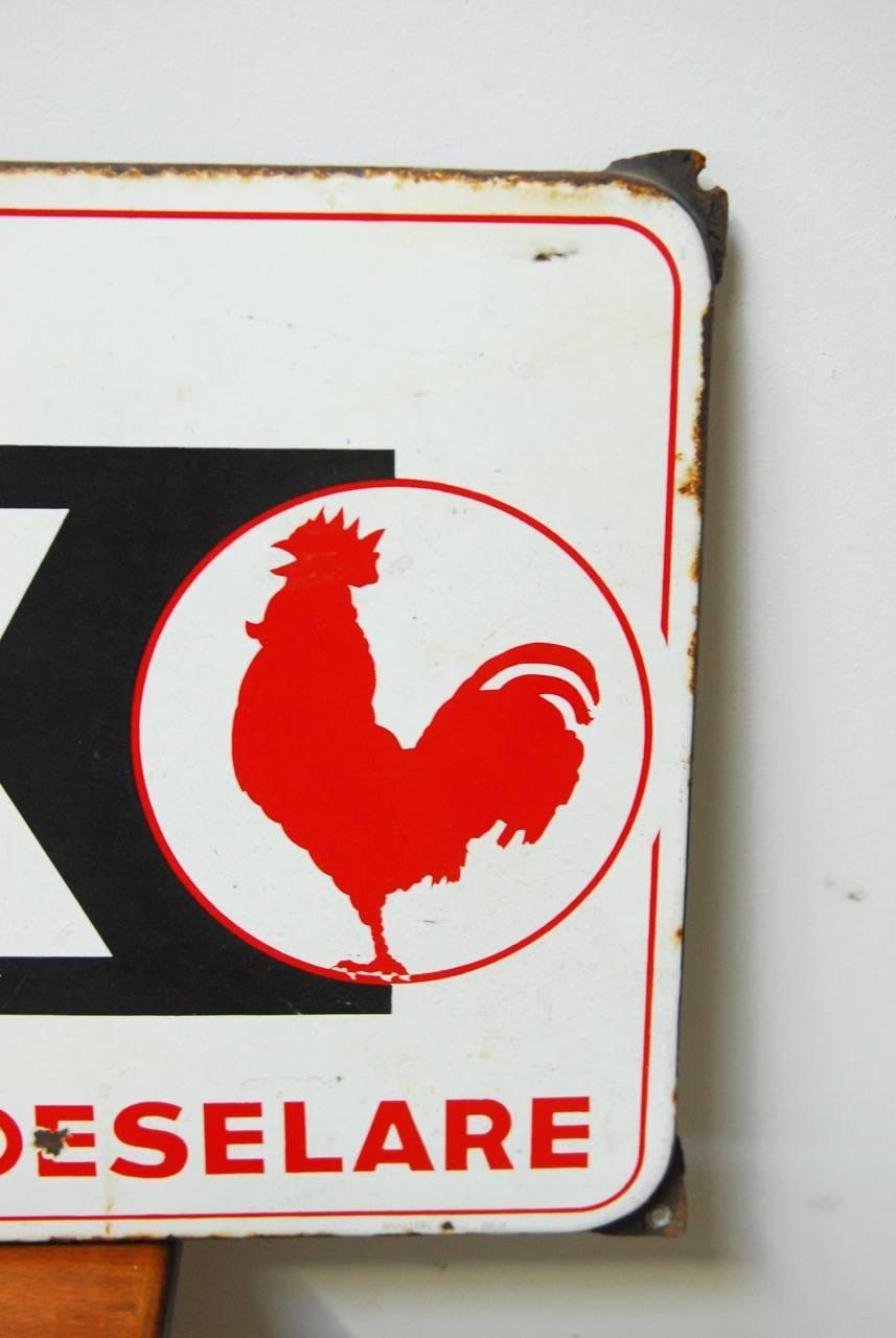Antique Dutch enameled metal farm animal feed sign featuring a bull and a rooster. Metal Folk Art sign with original enamel finish and a patinated metal patina. Thick, heavy sign from France.