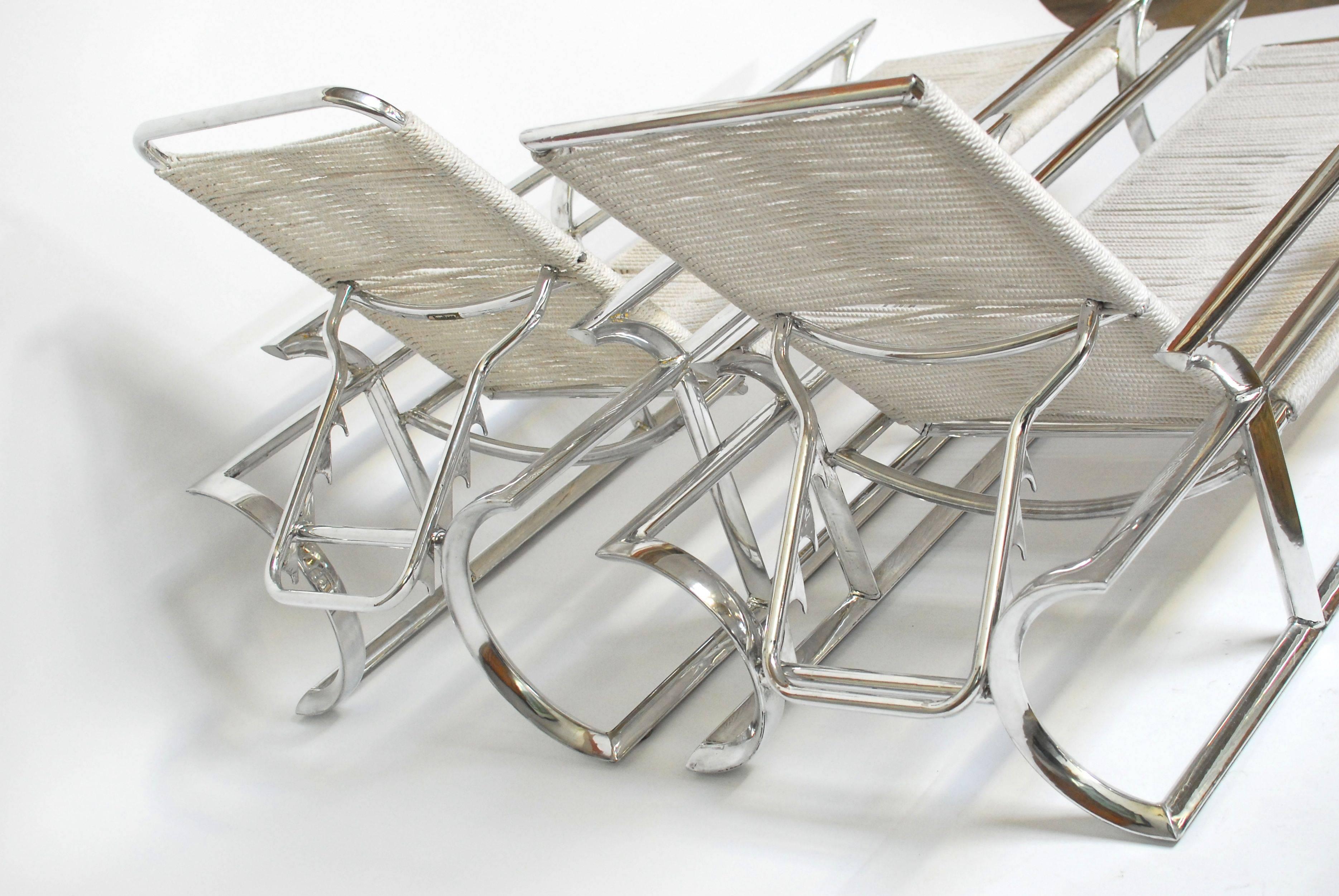 Polished Pair of Art Deco Tropitone Aluminum and Rope Lounge Chairs