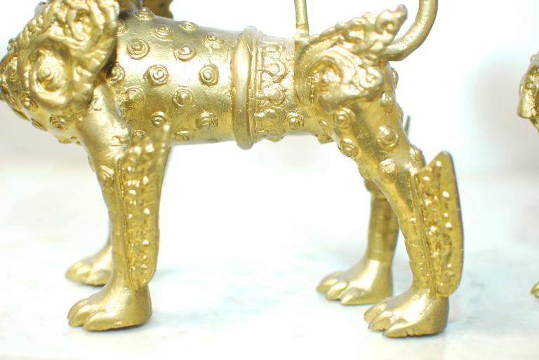 Pair of Southeast Asian Brass Foo Dogs with Gilt Finish For Sale at 1stdibs