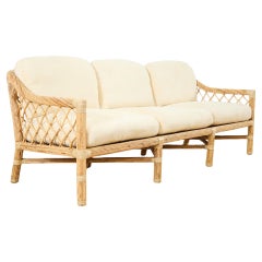 Divano McGuire in rattan organico e moderno