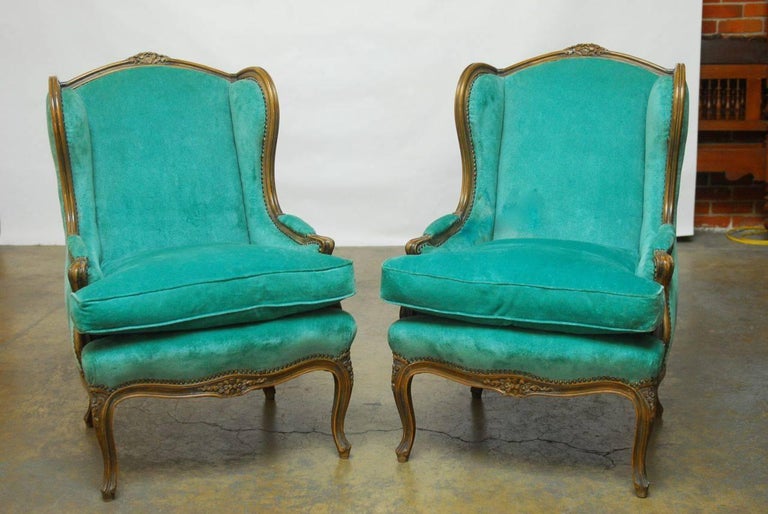 Pair of Louis XV Style Turquoise Velvet Wingback Bergères For Sale at