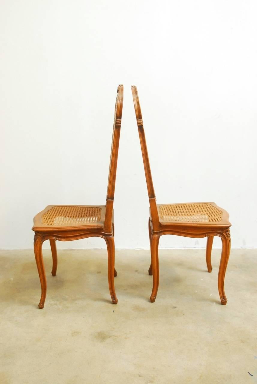 Pair of French Louis XV Style Cane Dining Chairs In Excellent Condition In Rio Vista, CA