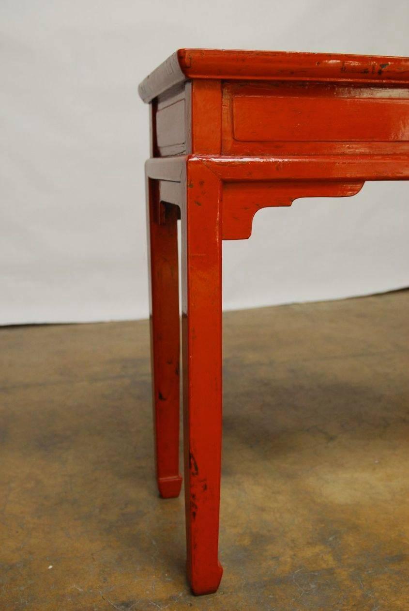 red lacquer side table