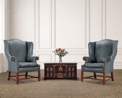 Pair of Baker Georgian Style Leather Wingback Library Armchairs