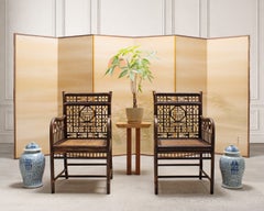 Ein Paar chinesische Chippendale-Sessel aus Rattan mit durchbrochenem Design von McGuire