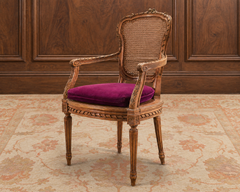 French Louis XVI Style Carved Walnut Cane Fauteuil Armchair