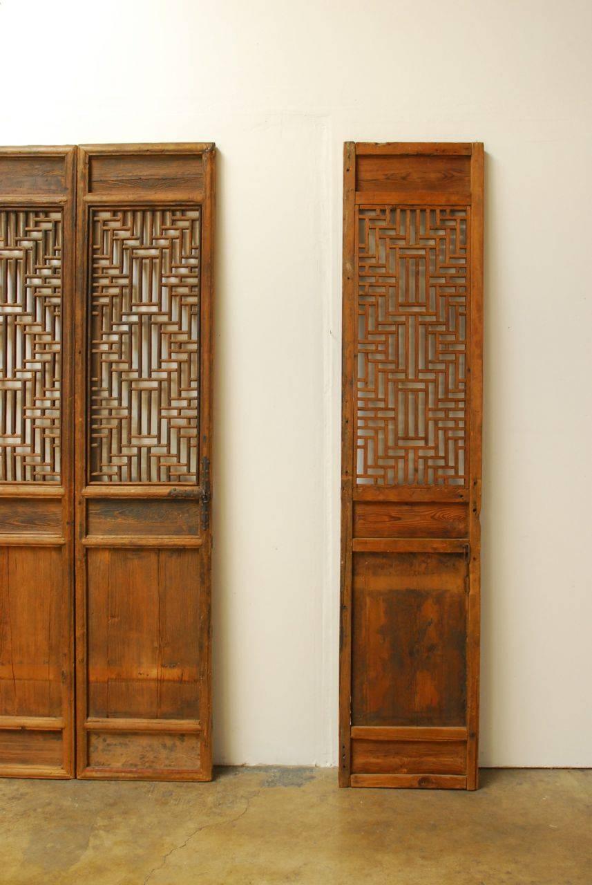 Hand-Carved Set of Four Chinese Lattice Panel Doors