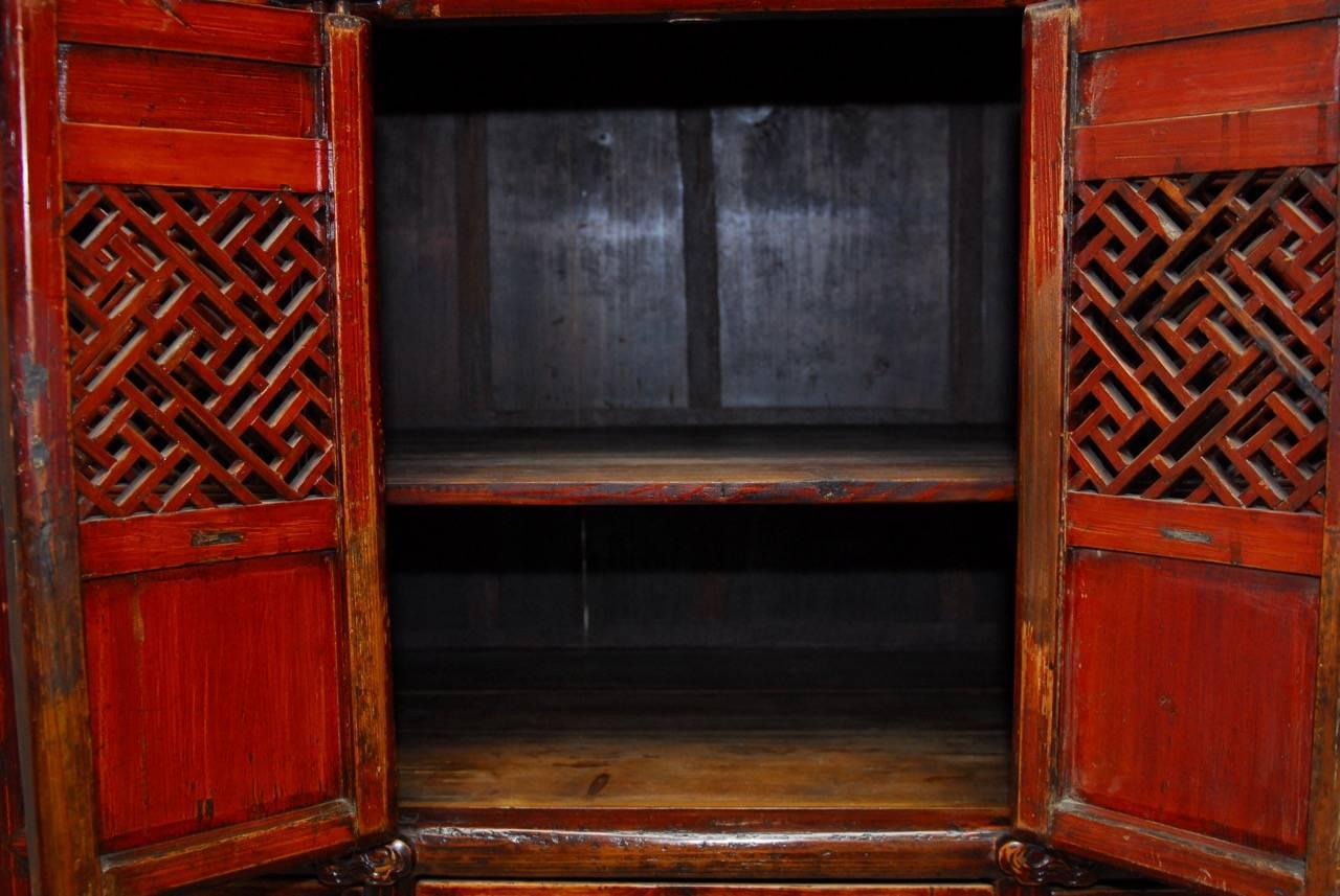 20th Century Chinese Lacquered Kitchen Cabinet with Lattice Doors