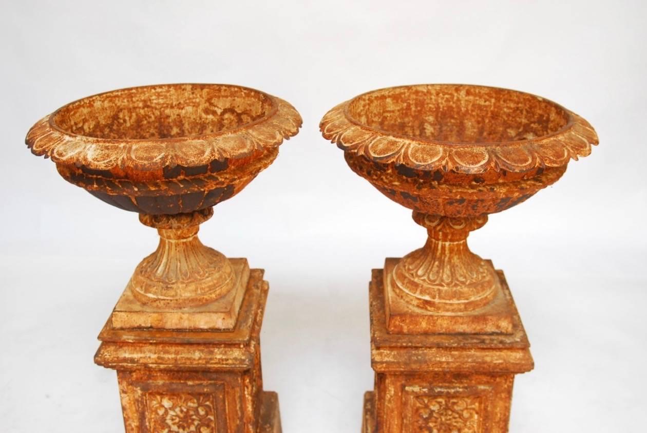 Pair of French Cast Iron Garden Urns on Plinths 1