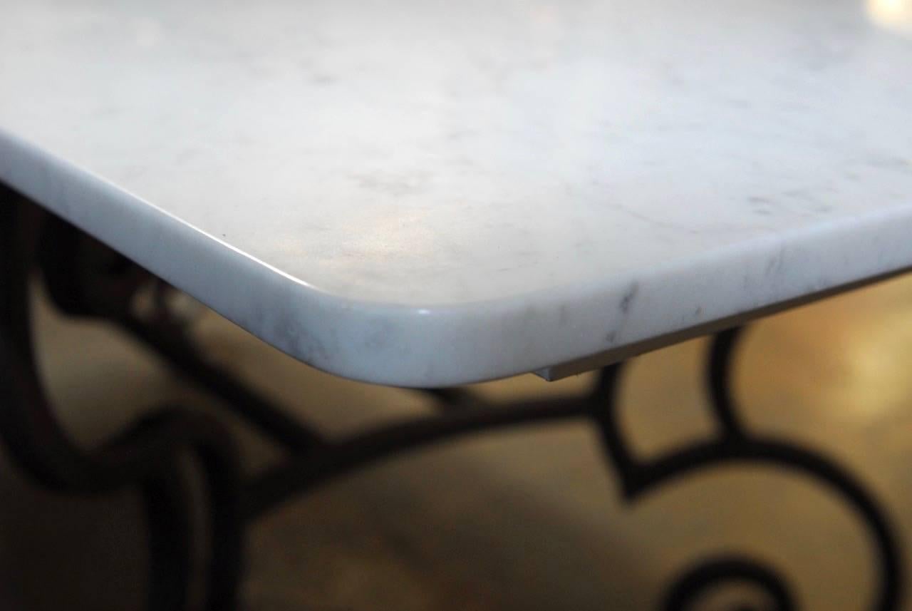 Hand-Crafted Italian Carrara Marble-Top Dining Table with Scrolled Iron Base