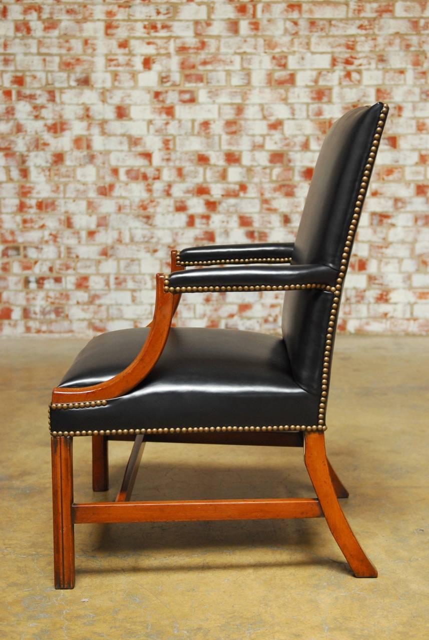 English Famous Pair of Black Leather Mahogany Gainsborough Library Chairs