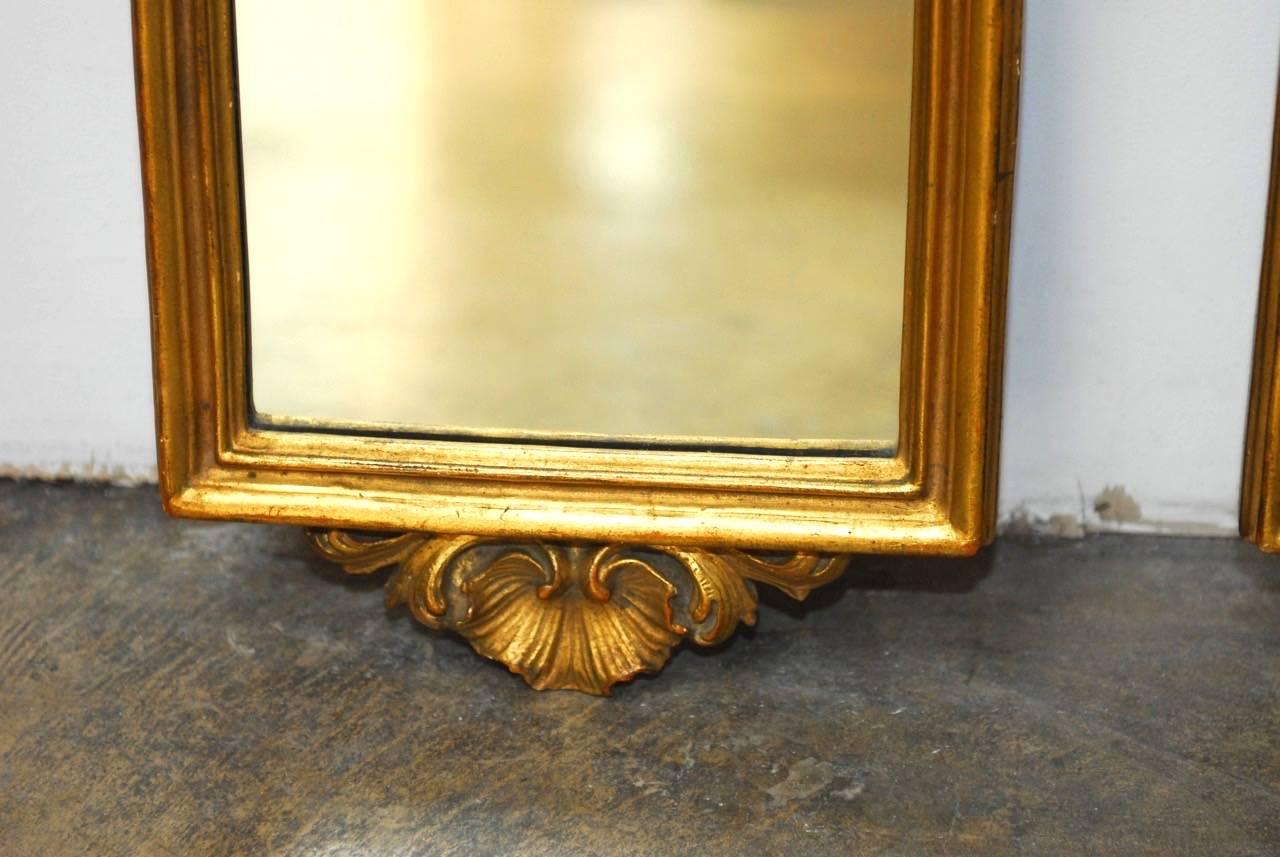 19th Century Pair of Italian Rococo Giltwood and Gesso Mirrors