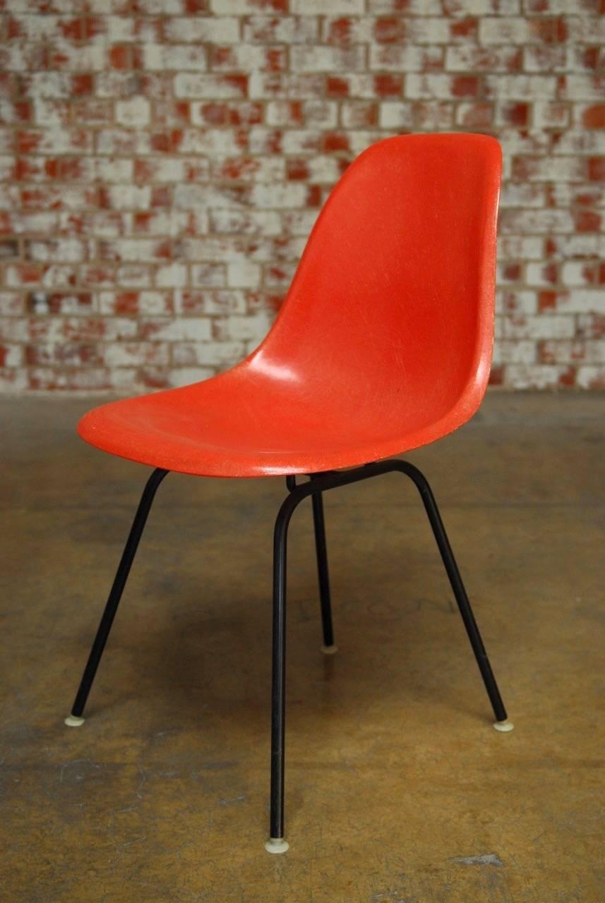 Mid-Century Modern Set of Four Mid-Century Miller Eames Orange Fiberglass Shell Chairs
