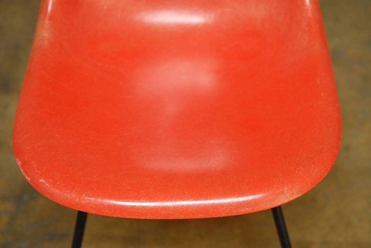 20th Century Set of Four Mid-Century Miller Eames Orange Fiberglass Shell Chairs