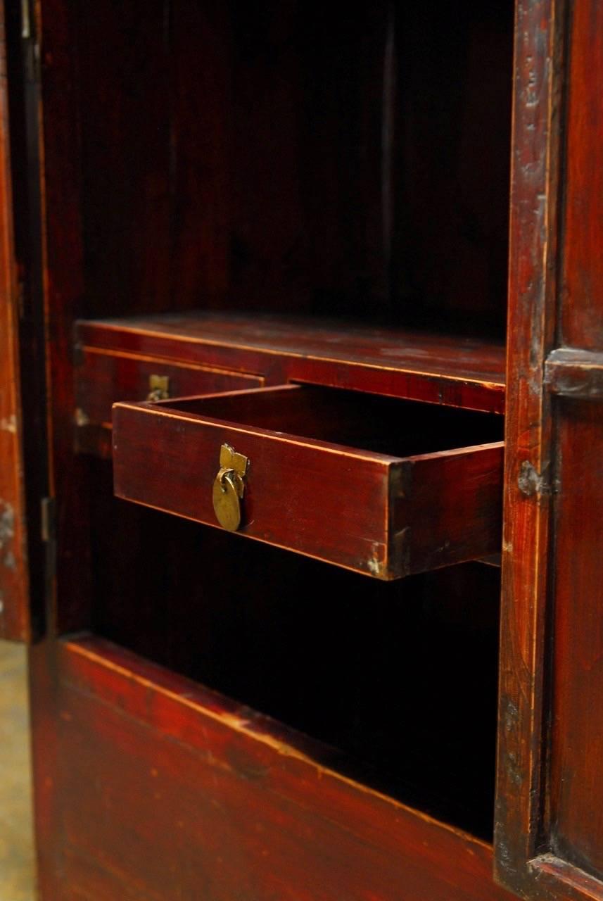 Hand-Carved Chinese Red Lacquer Cabinet with Display Shelf For Sale