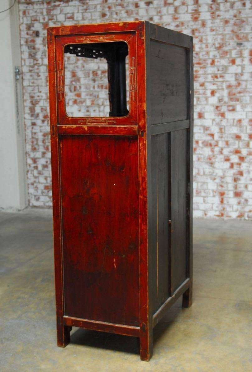 20th Century Chinese Red Lacquer Cabinet with Display Shelf For Sale