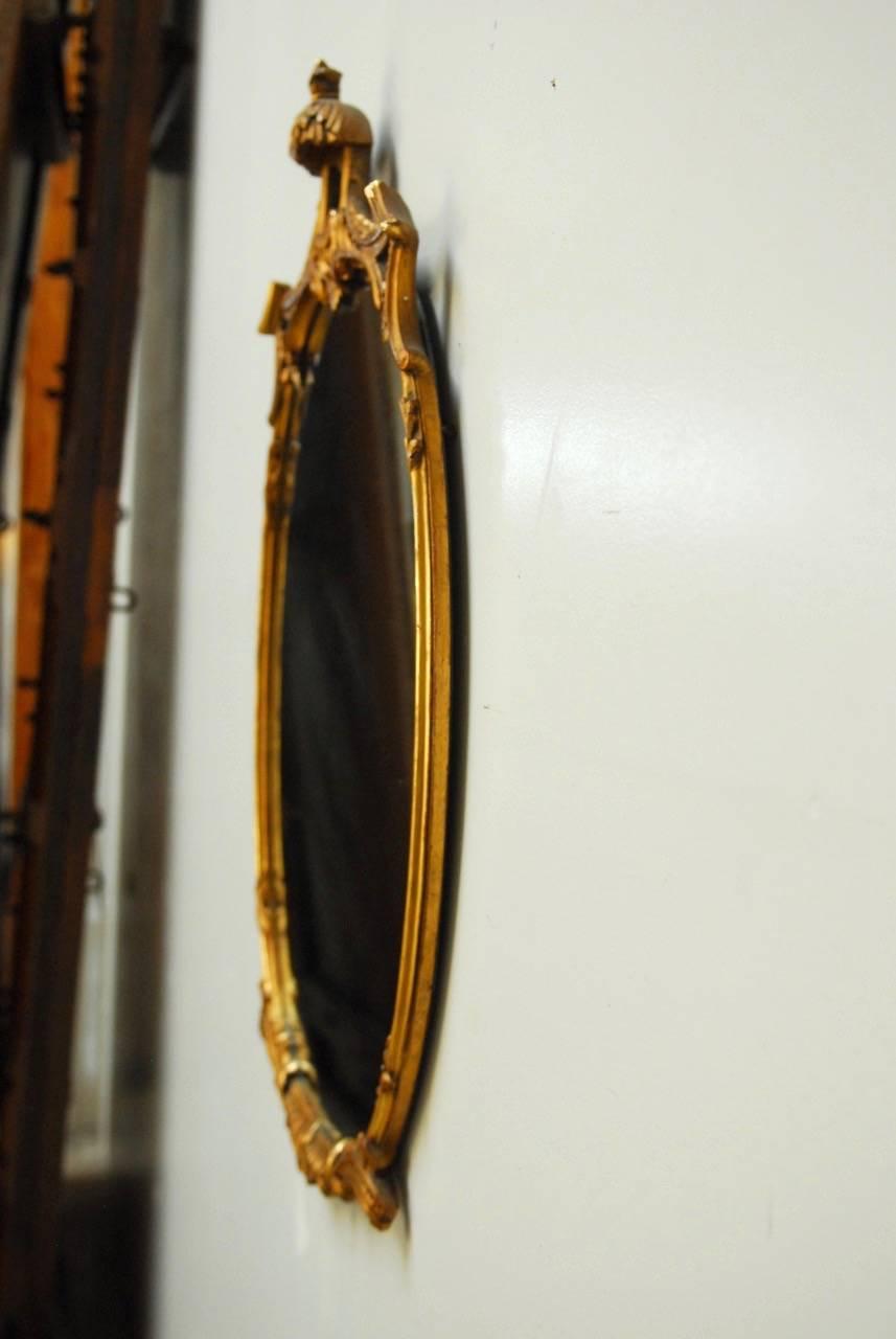 Italian Carved Giltwood Oval Pagoda Mirror 1