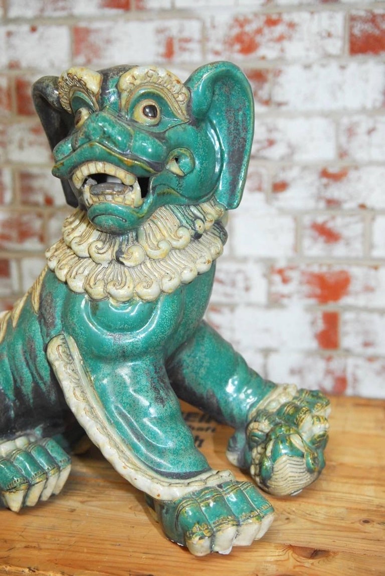 Pair of Chinese Glazed Porcelain Foo Dogs at 1stDibs