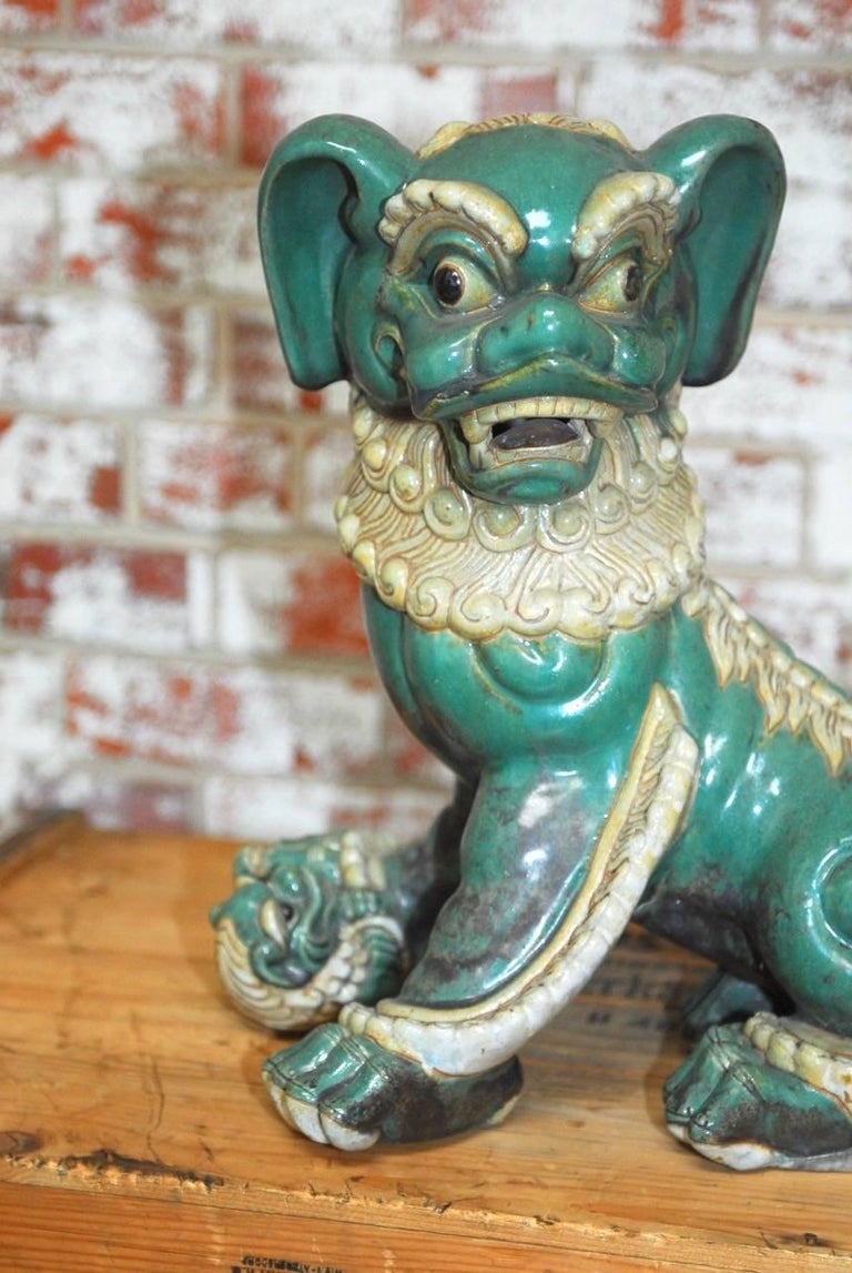 Pair of Chinese Glazed Porcelain Foo Dogs at 1stDibs