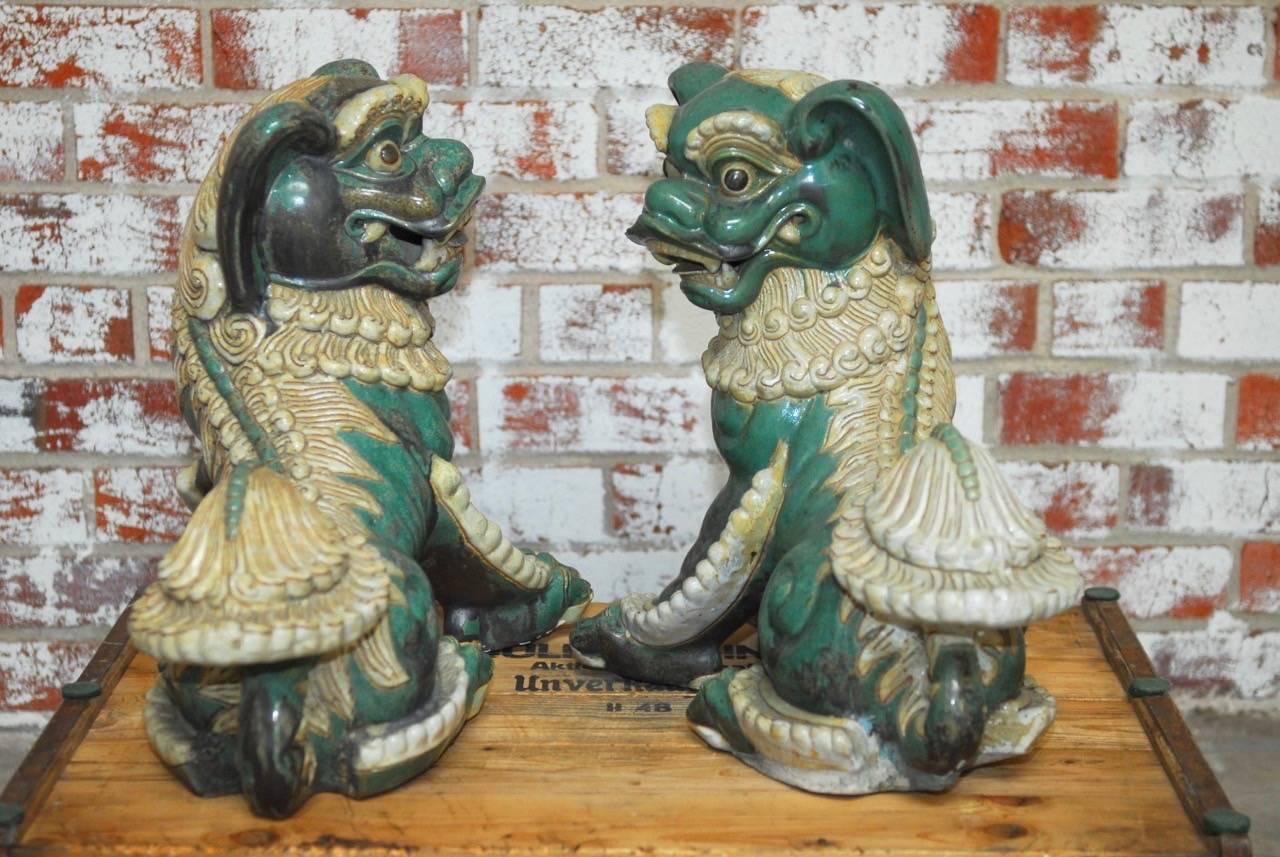 Pair of Chinese Glazed Porcelain Foo Dogs 1