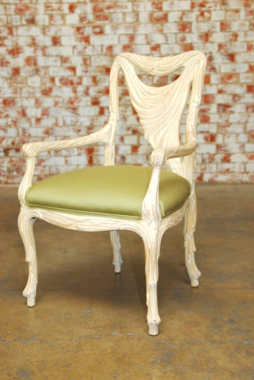 American Pair of Hollywood Regency Carved Swag Back Armchairs