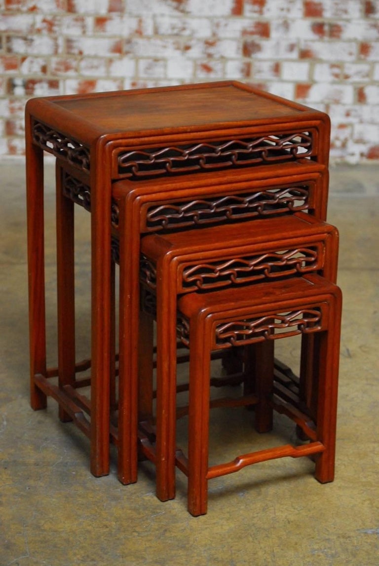 Set of four chinese carved hardwood nesting tables for Set of four chinese carved hardwood nesting tables for
