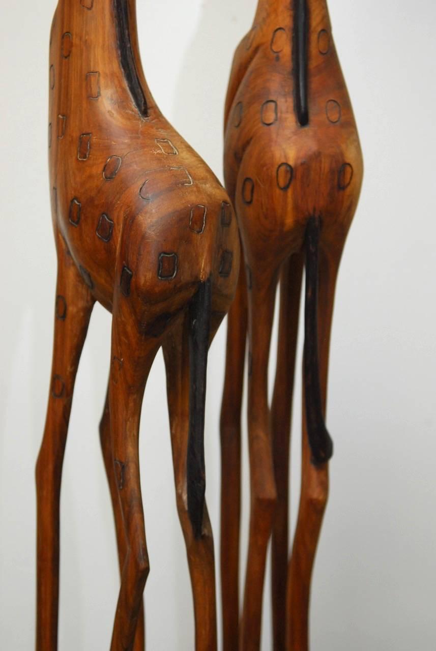 Pair of Namibian Hand-Carved Giraffe Sculptures 1