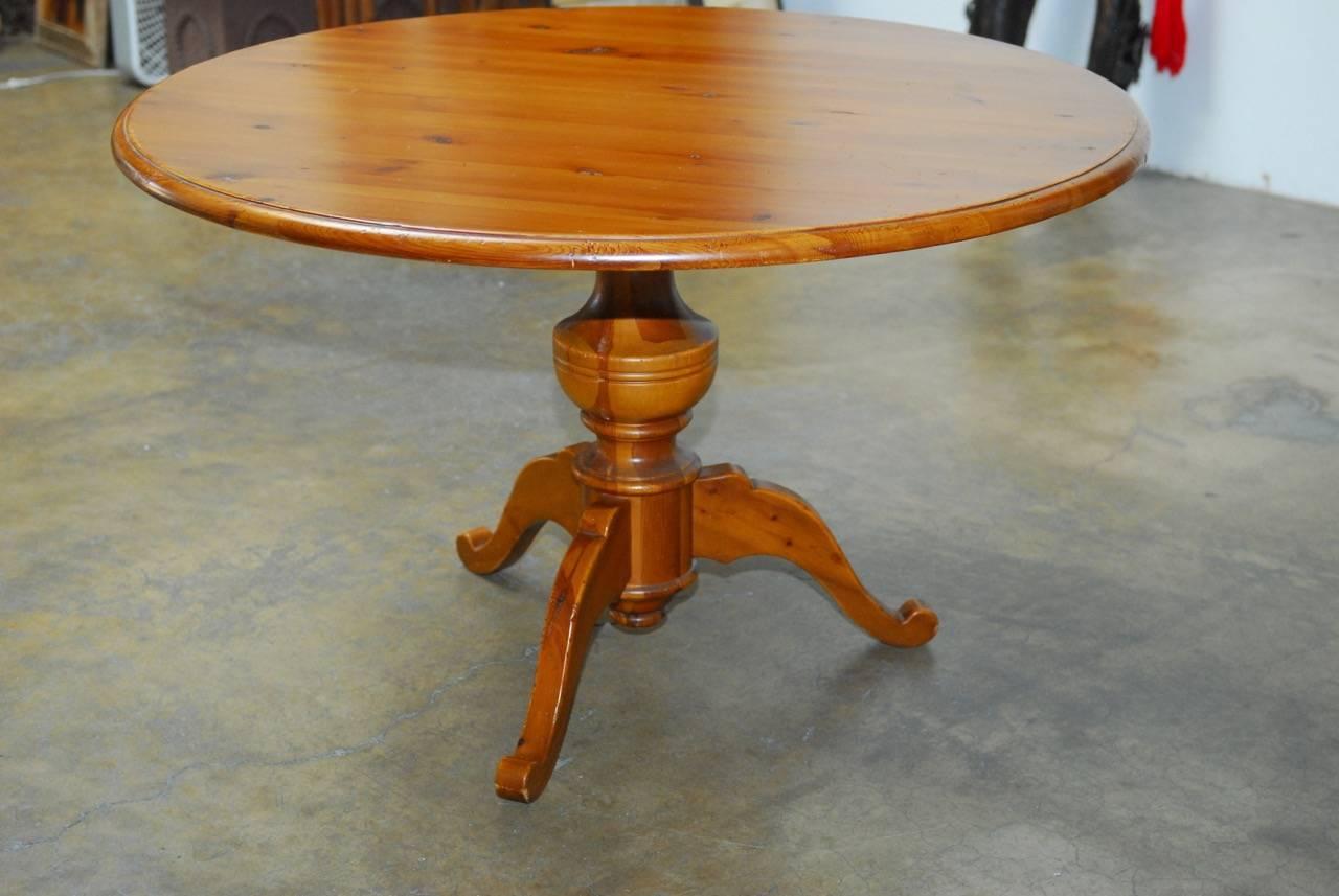 20th Century English Country Round Pine Pedestal Dining Table