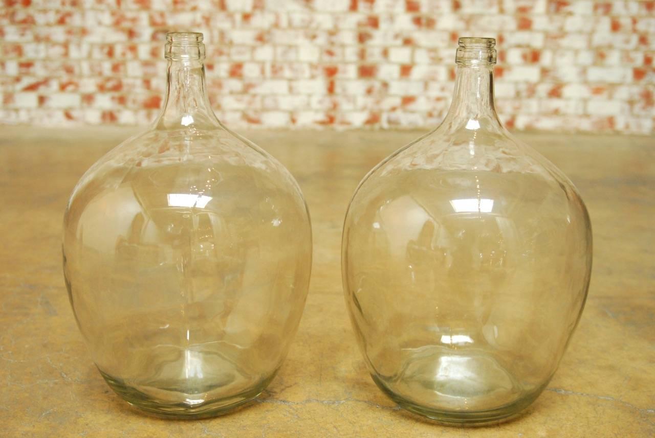European Pair of Woven Willow Demijohn Glass Wine Bottles 