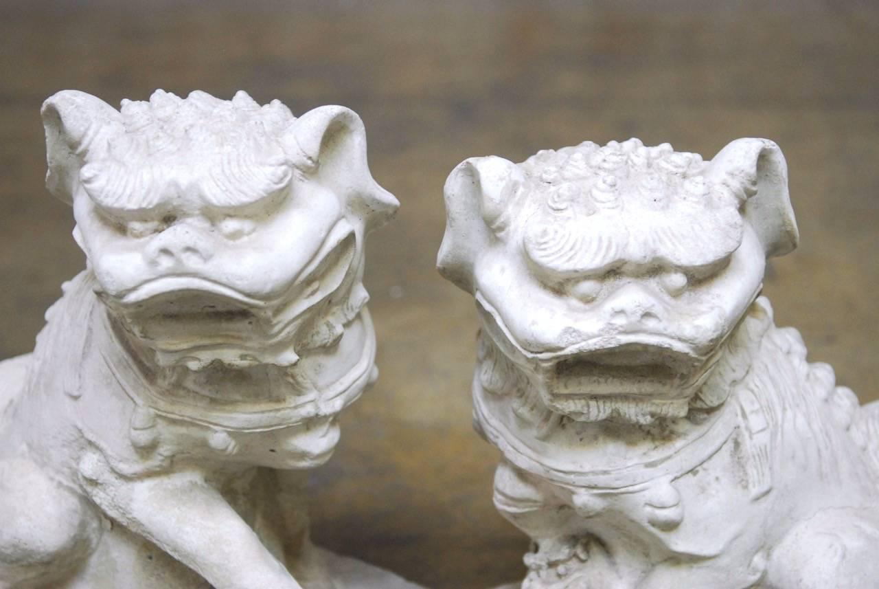 Chinese Export Pair of Molded Stone Chinese Foo Dog Statues 