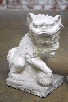 Pair of Molded Stone Chinese Foo Dog Statues