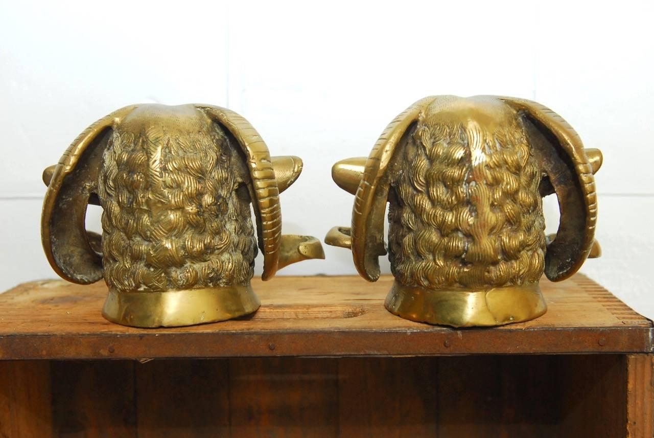 Neoclassical Pair of Patinated Brass Rams Head Sculptures