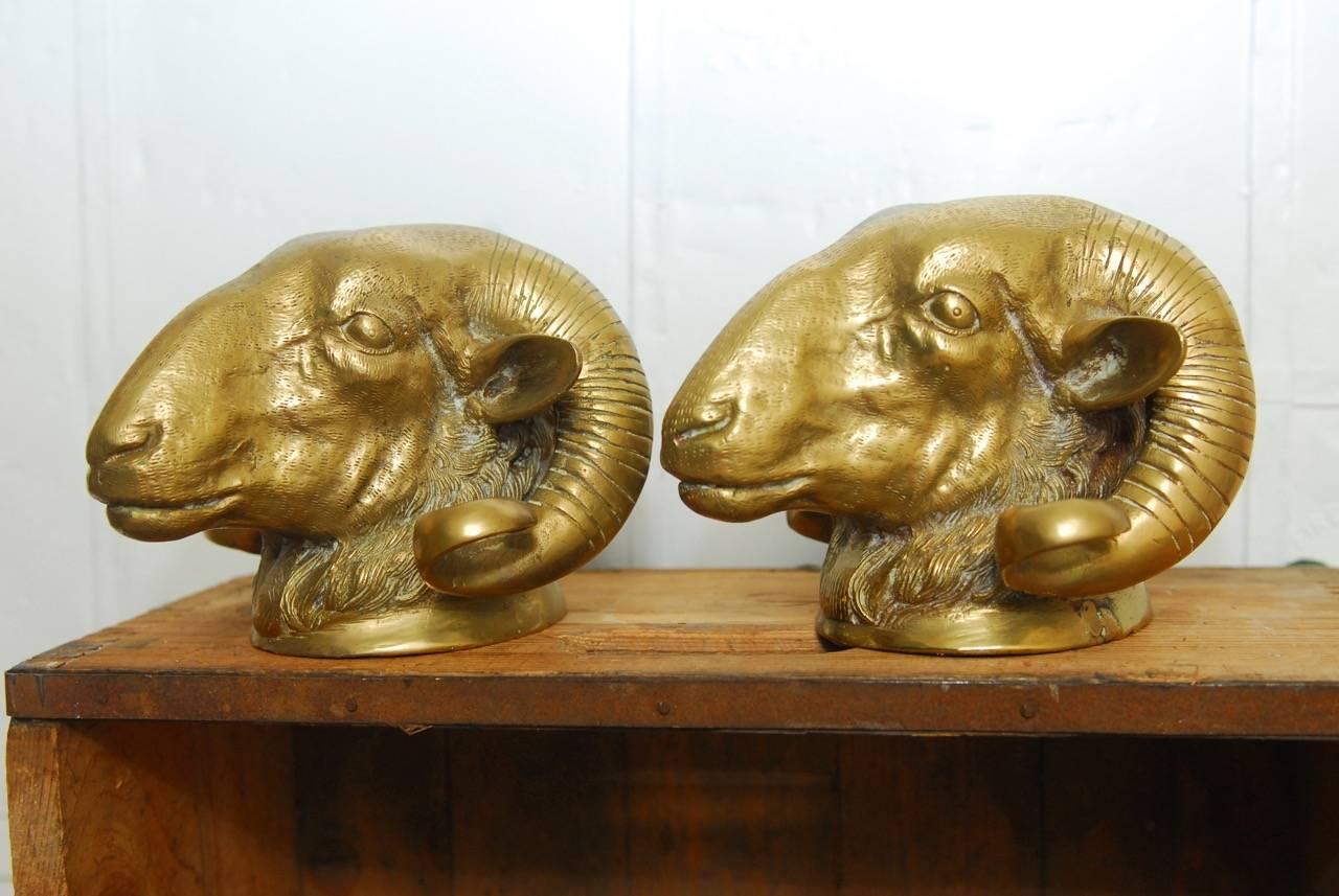 Pair of Patinated Brass Rams Head Sculptures 1