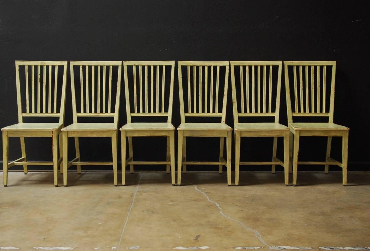 Fabulous set of six Italian lacquered slat back dining chairs by B&D Home Florence, Italy. Featuring a tapered back with a distressed lacquer finish for a perfect vintage look. Supported by tapered square legs with 