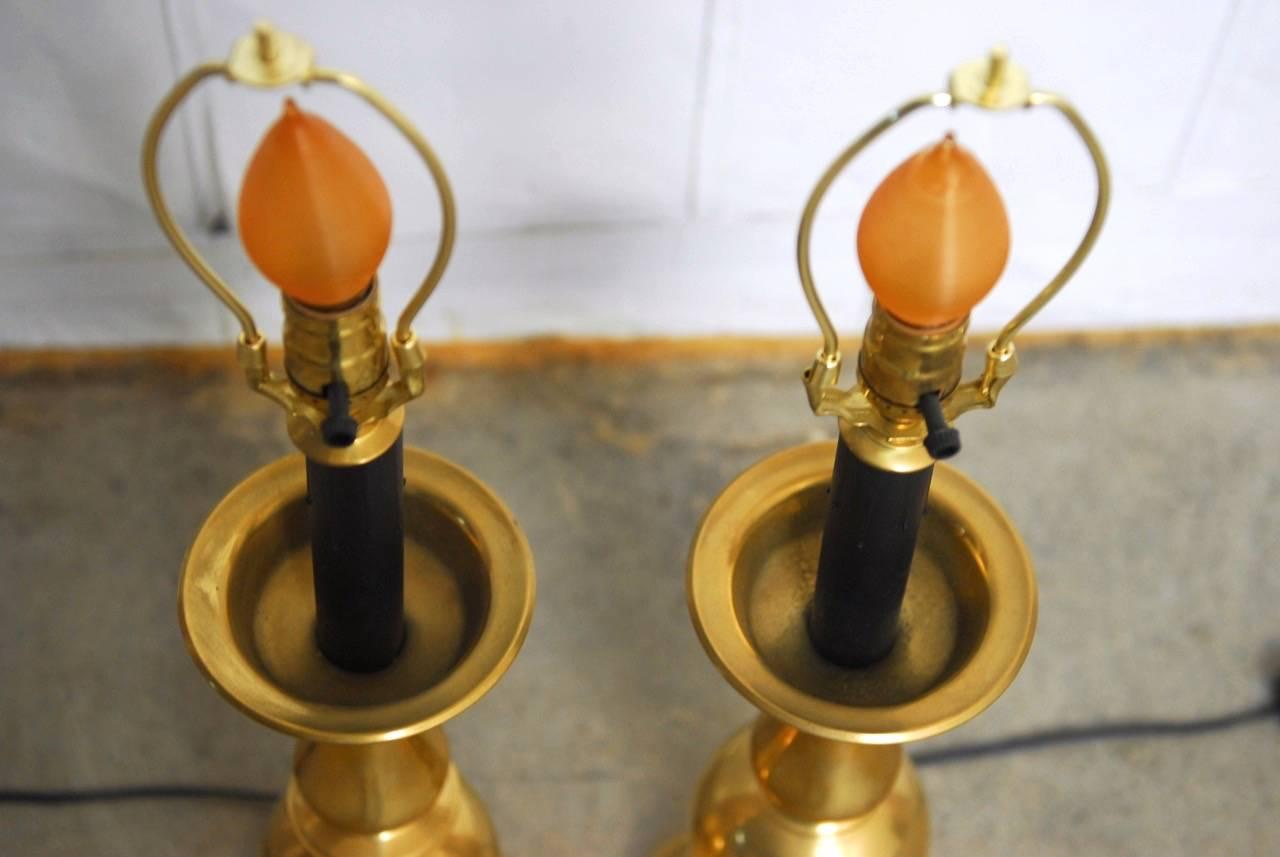 20th Century Pair of Polished Brass Baluster Form Candlestick Lamps